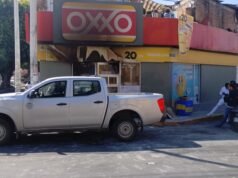 Resguardan elementos del ejército Oxxo incendiado